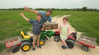 Using tractors to dig up treasure chest  Tractors for kids [upl. by Phene]