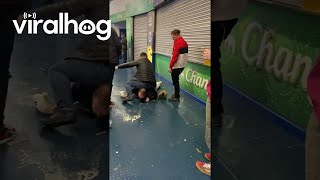 Two Men Slip And Slide On Wet Floors  ViralHog [upl. by Godfree]