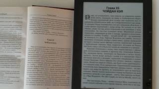 Kindle DX Graphite  Comparison with a paper book [upl. by Salvadore]