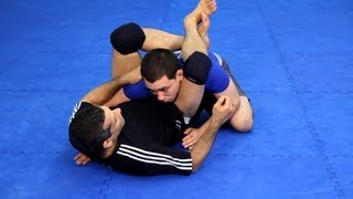 How to Do the Triangle Choke  MMA Fighting [upl. by Rossuck716]