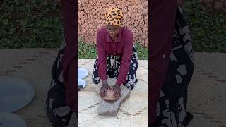 Grinding spices using a stoneafricanvillagelifeafrica [upl. by Ailat]