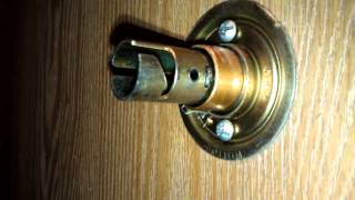 How to tighten a door knob [upl. by Aicitan]