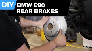 How To Replace BMW E90 Rear Brakes 328i Pads Rotors Sensors FCP Euro [upl. by Marcie]