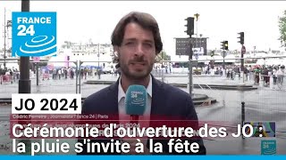 Cérémonie douverture des JO  la pluie sinvite à la fête • FRANCE 24 [upl. by Dlonra]