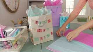 Giftology How to Fill a Gift Bag with Tissue [upl. by Delanos]