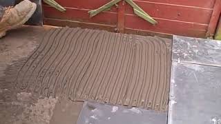 Laying slate on a solid concrete base using adhesive [upl. by Burley]