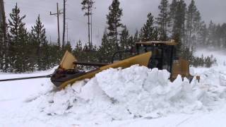 Plowing snow from roads in the spring in Yellowstone National Park [upl. by Nyltak]