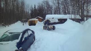 Skid steer plowing snow Bobcat 763 [upl. by Cirtap]