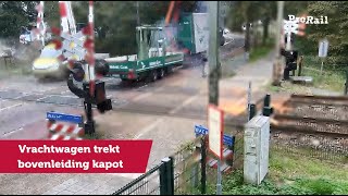 Vrachtwagen rijdt bovenleiding kapot bij overweg Vught  ProRail [upl. by Gresham]