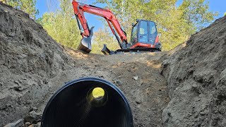 Pond dam pipe replacement with the Kubota KX080 4 [upl. by Ahsimak]