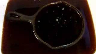 Cleaning Rusted CastIron Skillet in CocaCola [upl. by Enrev]