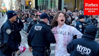 WATCH ProPalestinian Protesters Are Detained After Disrupting Macy’s Thanksgiving Day Parade [upl. by Donell]