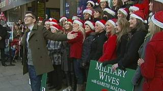 Military Wives Choir sing Wherever You Are live on Oxford Street London [upl. by Anirres]