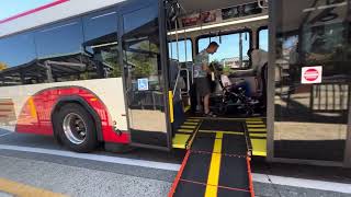 Kayden on new Disney Gillig Transport Bus Ramp Q’straint robot system Disney Springs BusBoyKayden [upl. by Lekar131]