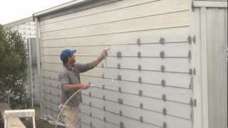 How To Spray A House  Airless spray painting exterior walls [upl. by Basso]