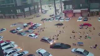 Rivers overflowing China flooded Underground garages highways and building submerged [upl. by Ardnaek598]