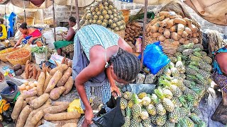 Market life in Togo during the rainy season come shopping with me in the largest market in Togo [upl. by Delle]