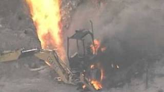 Backhoe ignites gasline fire [upl. by Eznyl759]