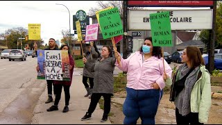 Advocates gather at Winnipeg MPs office demanding more social housing [upl. by Ahtivak]