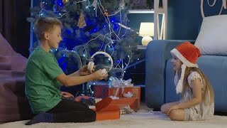 Kids Unwrapping Christmas Gifts At Home Stock Video [upl. by Aelanna]