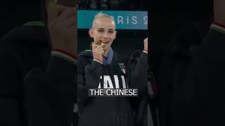 A Chinese on the podium dont know WHY Italians quotbitingquot their medals [upl. by Oeniri]