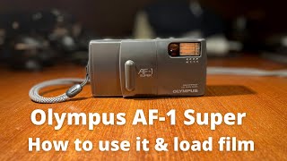 How to use an Olympus AF1 Super Loading amp Unloading Film and Main Functions [upl. by Emersen672]