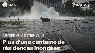 Une fuite deau aux allures de geyser inonde le centreville de Montréal [upl. by Airotal]