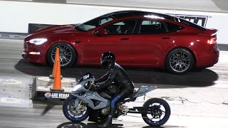 Tesla Plaid vs BMW 1000RR Superbike  drag racing [upl. by Rekyr853]