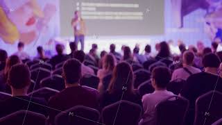 Audience attending a speaker presentation at a conference event [upl. by Markowitz]