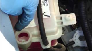 How to check and add coolant fluid Toyota Yaris Years 20062011 [upl. by Roti]