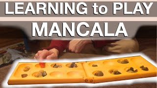 Learning how to play Mancala [upl. by Annaek]