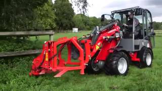 Weidemann minishovel met palen grasmaaier [upl. by Korry]