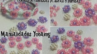 FLORES HECHAS CON CUENTITAS PLASTICAS O PERLITAS PARA DIADEMAS Y OTROS ACCESORIOS [upl. by Tandie]