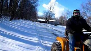 Snow plowing with the 1991 2082 cub cadet super garden tractor [upl. by Enilorak424]