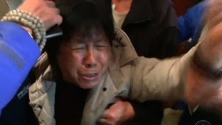 Malaysia Airlines Flight 370 Families react with grief anger to news no one survived [upl. by Lane958]