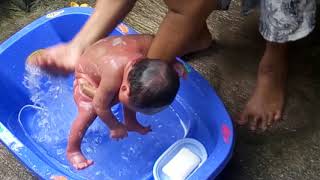 How To Bath a Newly Born Baby In A Traditional Way Asian Style [upl. by Araic]