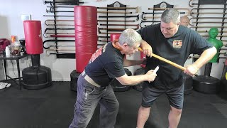 Cane Self Defense with knowing the dangers of pulling an attacker in close by the crook [upl. by Irak]