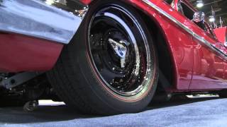 Red Sled 409 Impala Sitting on Redlines at SEMA Show 2013 [upl. by Eusoj675]