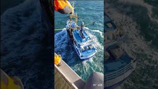 Drop off of the SAR Diver and SAR Medic on a pitching fishing vessel by Belgian Air Force NH90 SAR [upl. by Zechariah630]