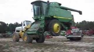 Unloading A 125 Ton 9610 John Deere Combine with Hough 560 [upl. by Ury]