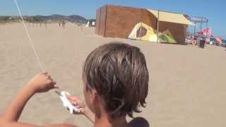 Kids Flying Kites on Beach at Playa Brava in Spain [upl. by Ainirtak293]