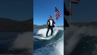 Mark Zuckerberg dons tux in July 4 surfing video while holding beer and US flag shorts [upl. by Suzie]