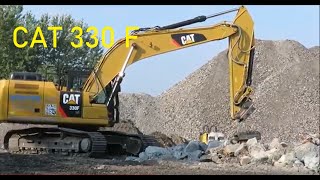 Excavator CAT 330F with pulverizer [upl. by Alyled]