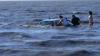 Car covered by the incoming tide [upl. by Schroder]