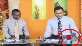 Glass Of Water Moves Across Table During Live Broadcast [upl. by Job]